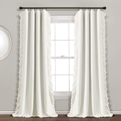 Flowing blackout white curtains