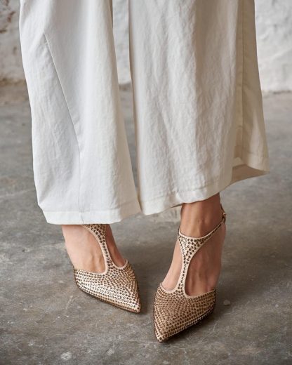 Gold pointed high heels
