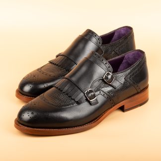 Men's black pair of monk shoes