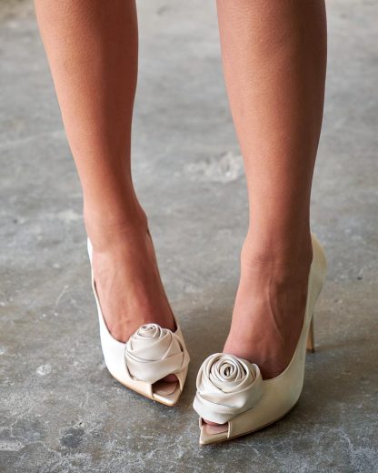 Rose detail open toe pumps