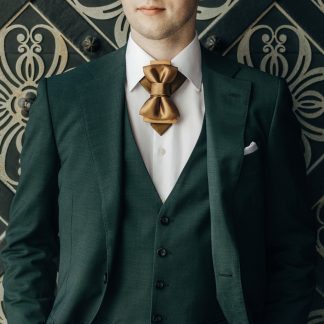 Elegant brass bow tie