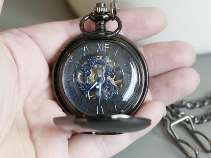 Black and blue skeleton mechanical pocket watch