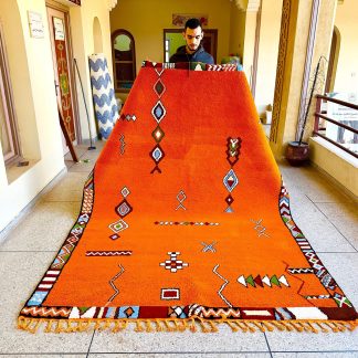 Warm orange ethnic style handmade carpet