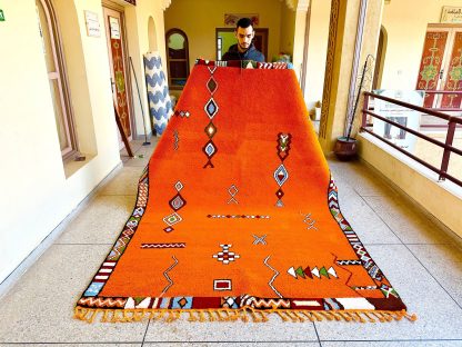 Warm orange ethnic style handmade carpet