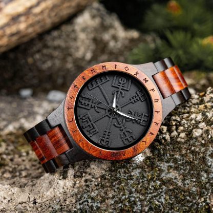 Black dial watch with mysterious rune pattern