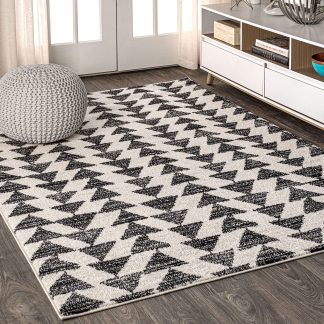 Geometric triangle pattern black and white carpet