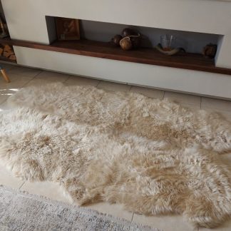 Light beige faux fur rug