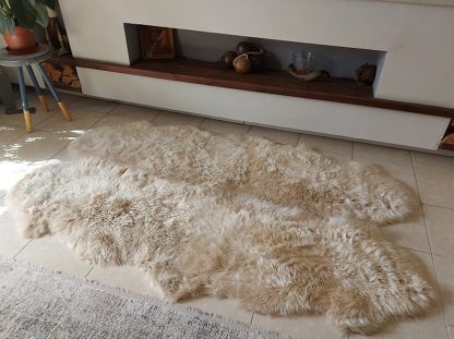 Light beige faux fur rug