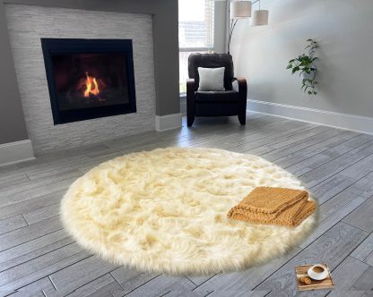 Beige round faux sheepskin rug