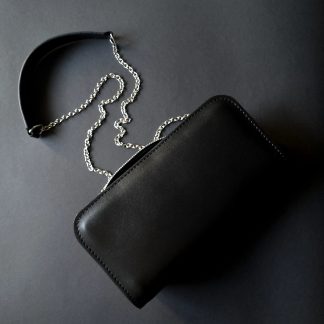 Black leather bag with chain shoulder strap