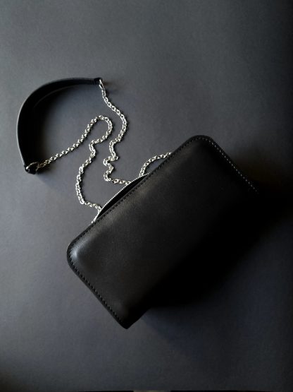 Black leather bag with chain shoulder strap