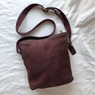 Burgundy suede bucket bag