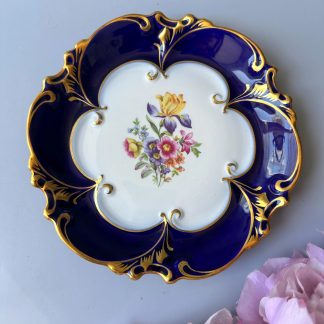 Porcelain plate with gilded flowers