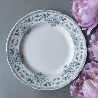 Fresh green porcelain plate with floral pattern