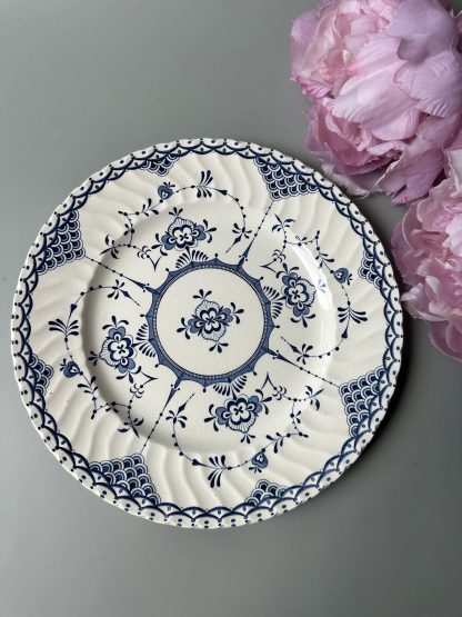 Classic blue and white porcelain plate with twined branches
