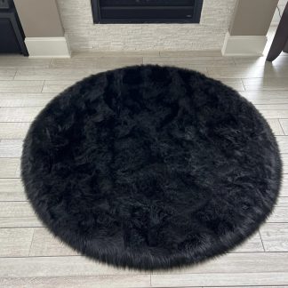 Black premium round faux fur rug