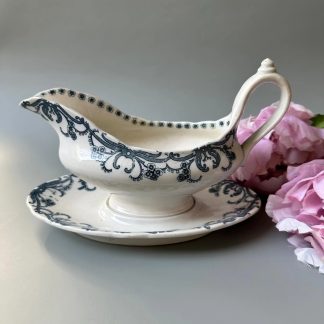 Ceramic sauce boat with blue and white strokes