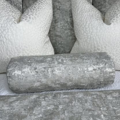 Silver-grey velvet cylindrical pillow