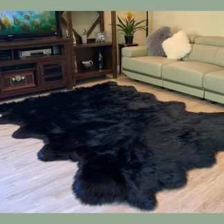 Black faux sheepskin rug