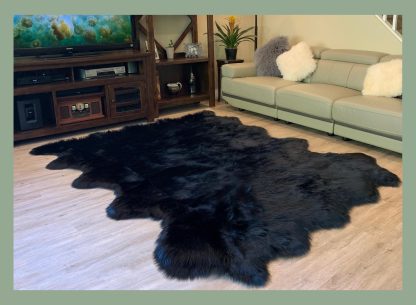 Black faux sheepskin rug