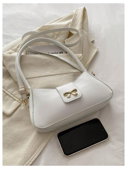 Cream leather underarm bag with bow embellishment - Image 3