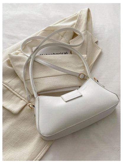 Cream leather underarm bag with bow embellishment - Image 2