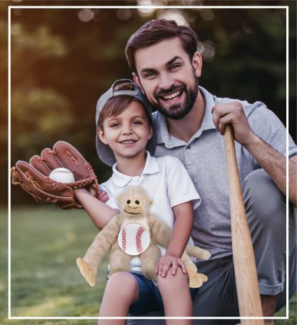 Long-armed monkey holding baseball plush toy - Image 4