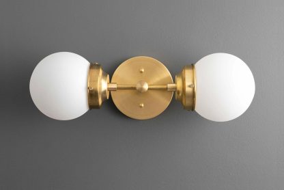 Vintage double ball brass wall lamp