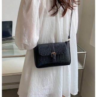 Croc-embossed leather crossbody bag