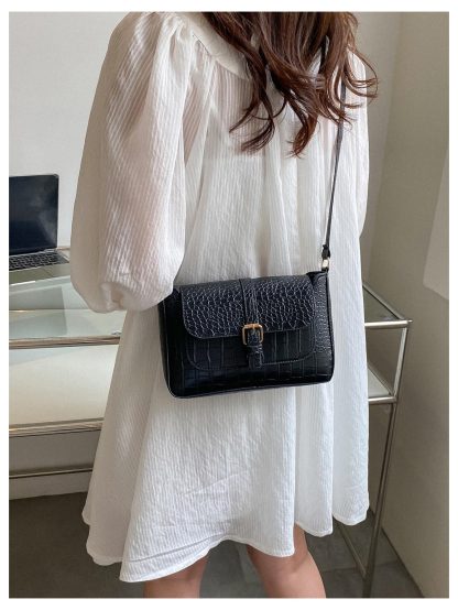 Croc-embossed leather crossbody bag