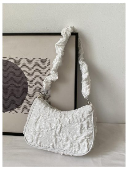 Lace and pearl bow embellished bag
