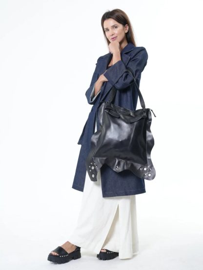Dark ruffle-trimmed soft leather handbag