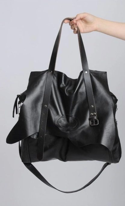 Dark irregular soft leather handbag