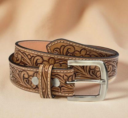 Comes with a vintage carved leather belt