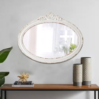 French gentle carved oval mirror