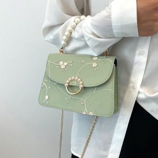 embroidered pearl handle mini bag