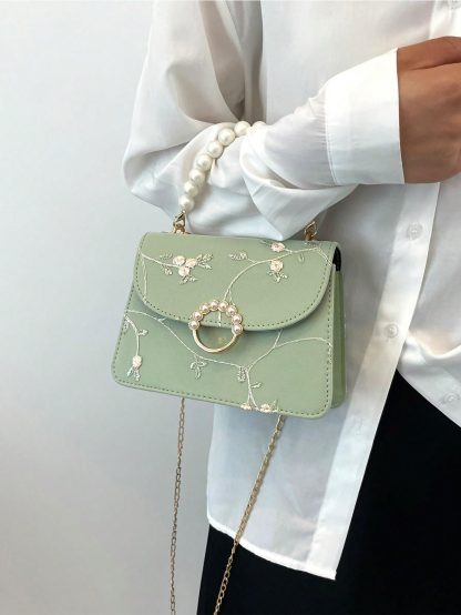 embroidered pearl handle mini bag
