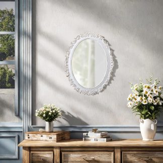 French carved oval mirror