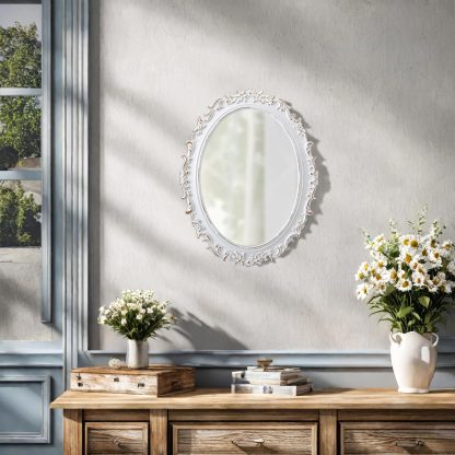 French carved oval mirror