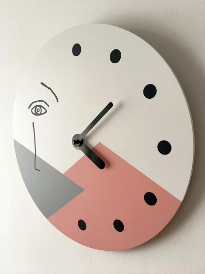 Artistic geometric abstract human face wall clock