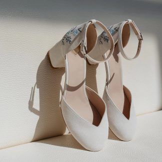 Artistic floral embroidered pumps