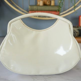 Vintage white patent leather curved handbag