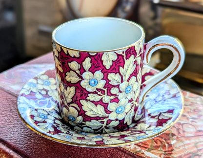 Rose-red floral gilded cup and saucer set