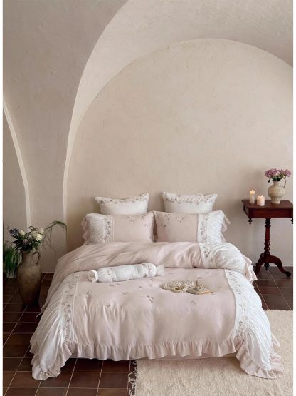 Soft pink embroidered ruffled bedding four-piece set