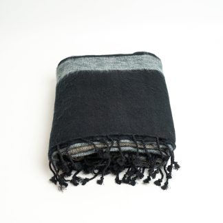 Black and grey fringed wool-blend throw blanket