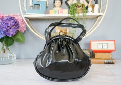 Vintage black shiny leather lock handbag
