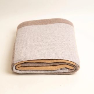 Earth-tone patchwork knitted throw blanket