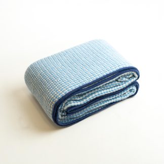 Blue and white checked wool-blend throw blanket