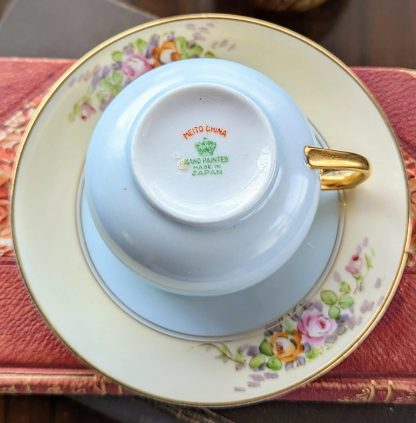 Glazed hand-painted floral cluster cup and saucer set - Image 3