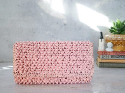 Handmade pink beaded clutch